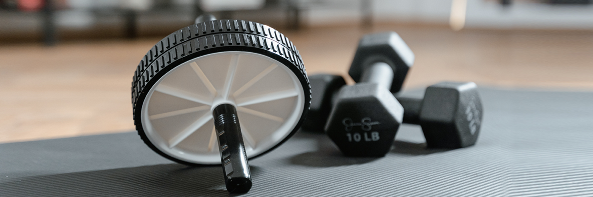 Rubberized dumbbells, fitness rollers...